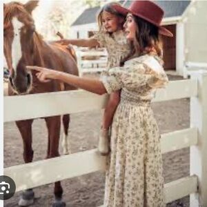 XS fits S Jessakae smocked “harvest” dress. Lined, cotton puffed sleeves